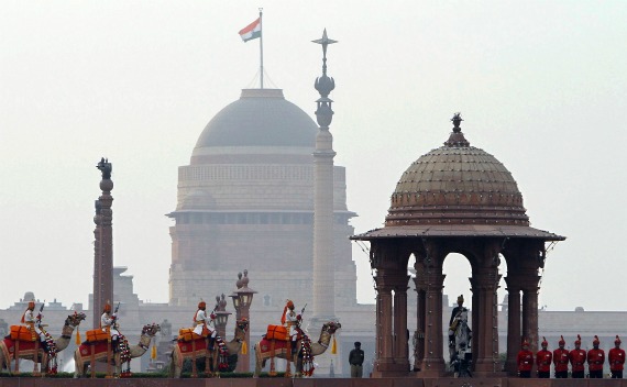 India’s BSF soldiers ride their camels in front of the Presidential Palace during the full-dress rehearsal for 