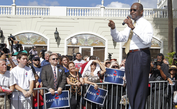 Republican candidate for U.S. president Herman Cain makes an appearance at iconic Cuban restaurant ’Versailles’ in the Little Havana neighborhood in Miami, Florida November 16, 2011. REUTERS/Joe Skippe