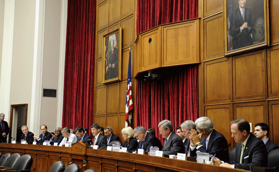 The twelve members of the Congressional Super Committee, six Democrats and six Republicans, gather for opening remarks as the panel holds its inaugural meeting to search for at least $1.2 trillion in new deficit reductions, in Washington, DC, September 8, 2011. REUTERS/Mike Theiler