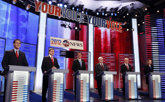 Republican presidential candidates (L-R) former U.S. Senator Rick Santorum (R-PA), Texas Governor Rick Perry, former Massachusetts Governor Mitt Romney, former U.S. House Speaker Newt Gingrich (R-GA), U.S. Representative Ron Paul (R-TX), and U.S. Representative Michele Bachmann (R-MN), pose before the Republican Party presidential candidates debate at Drake University in Des Moines, Iowa, December 10, 2011. REUTERS/Jeff Haynes 