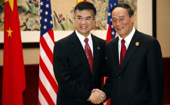 Gary Locke  (L) and Wang Qishan (R)