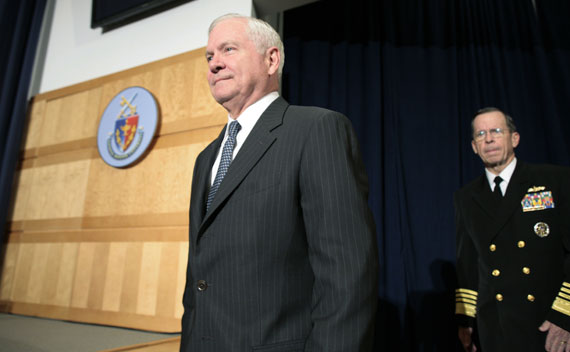 U.S. Secretary of Defense Gates and Admiral Mullen enter the auditorium before Oabma’s speech about the conflict in Libya at the National Defense University on March 28, 2011.