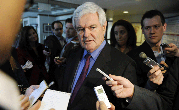 Newt Gingrich speaks to reporters after a news conference at the National Press Club in Washington on March 18, 2011.