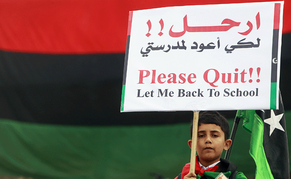 A Libyan boy protests during Friday prayers in Benghazi. 