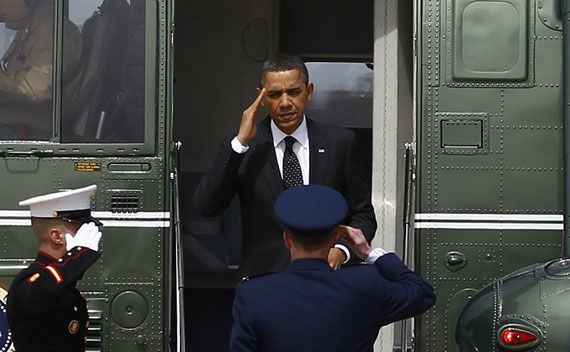 President Barack Obama steps off Marine One to board Air Force One at Andrews Air Force Base near Washington on March 29, 2011.