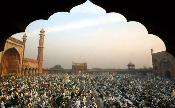 Indian Muslims wait for morning Eid prayer at the Jama Masjid in New Delhi (Pawel Kopczynski/Courtesy Reuters).