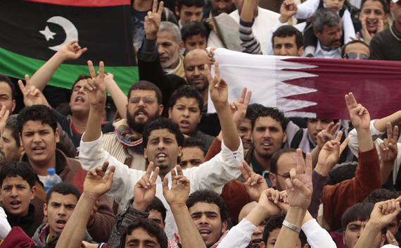 Libyan Protesters celebrate after a U.N. resolution authorising a 