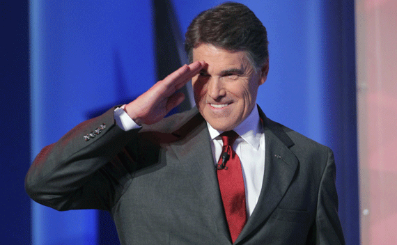 Texas Governor Rick Perry takes the stage prior to the CNN/Tea Party Republican presidential candidates debate in Tampa, Florida, September 12, 2011. REUTERS/Scott Audette