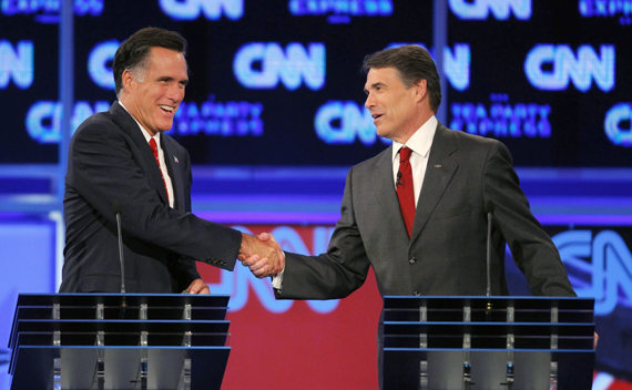 Mitt Romney and Rick Perry shake hands at the conclusion of the CNN/Tea Party Republican presidential candidates debate in Tampa, September 12. (Scott Audette/ courtesy Reuters)