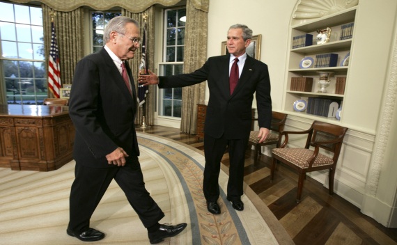  US President Bush escorts Secretary of Defense Rumsfeld from the Oval Office in Washington on August 11, 2006 (Courtesy Reuters/Kevin Lamarque).