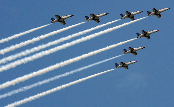 A formation of military AT-3 fighter jets perform during an airforce demonstration at Songshan airport in Taipei September 2, 2007. REUTERS/Nicky Loh (TAIWAN)