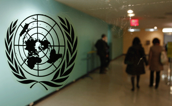 The United Nations logo is displayed on a door at U.N. headquarters in New York February 26, 2011. The U.N. Security Council plans to vote on Saturday on a draft resolution that would slap sanctions on Libya’s leaders and refer the recent violence to the International Criminal Court, diplomats said. REUTERS/ Joshua Lott (UNITED STATES - Tags: POLITICS)