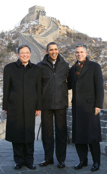 President Obama poses with then Chinese ambassador to U.S. Zhou and U.S. ambassador to China Jon Huntsman at the Great Wall of China