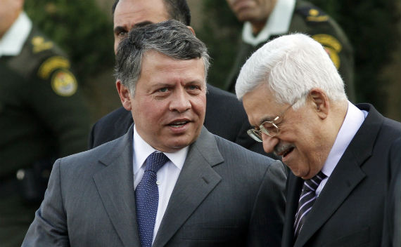 King Abdullah of Jordan (L) speaks with Palestinian President Mahmoud Abbas during a welcoming ceremony in the West Bank city of Ramallah November 21, 2011. Abdullah arrived in Ramallah on Monday for a rare visit to the Israeli-occupied West Bank, as the Palestinians pursue statehood in a region riveted by the slide towards civil war in Syria and mounting unrest in Egypt (Mohamad Torokman/Courtesy Reuters).