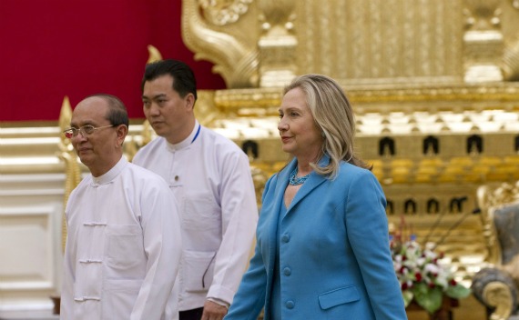 U.S. Secretary of State Hillary Clinton walks with Myanmar’s President Thein Sein at the President’s Office in Naypyitaw on December 1, 2011.