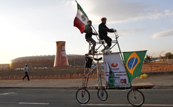 Fans outside Johannesburg’s Soccer City stadium before Mexico and Brazil World Cup game (Siphiwe Sibeko / Courtesy Reuters).