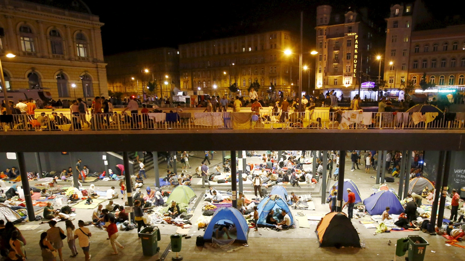 Migrants are seen at a makeshift camp in an underground station in front of the Keleti railway station in Budapest, Hungary.