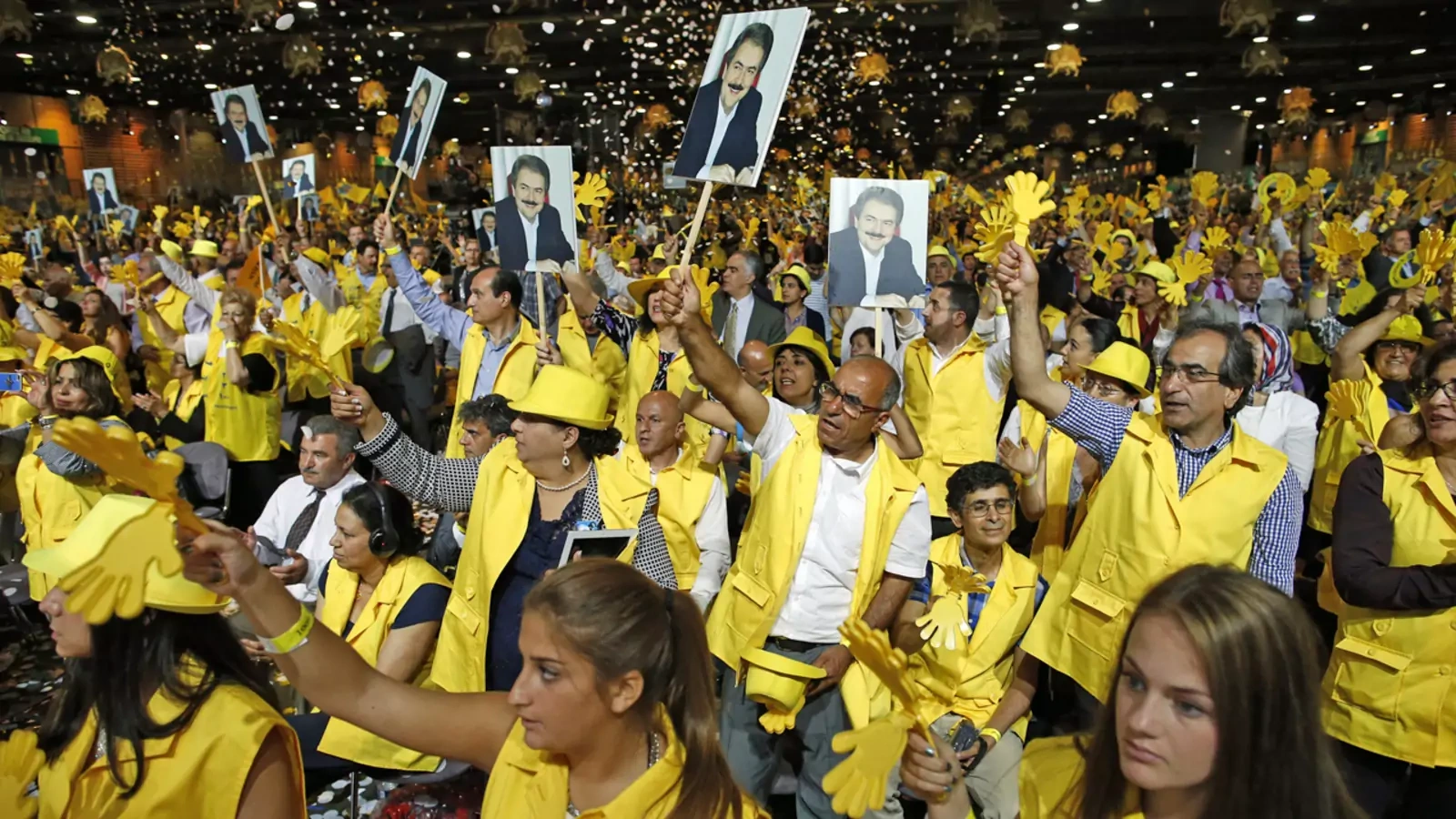 Supporters of Maryam Rajavi, president-elect of the National Council of Resistance of Iran, take part in a rally near Paris, June 2014. 