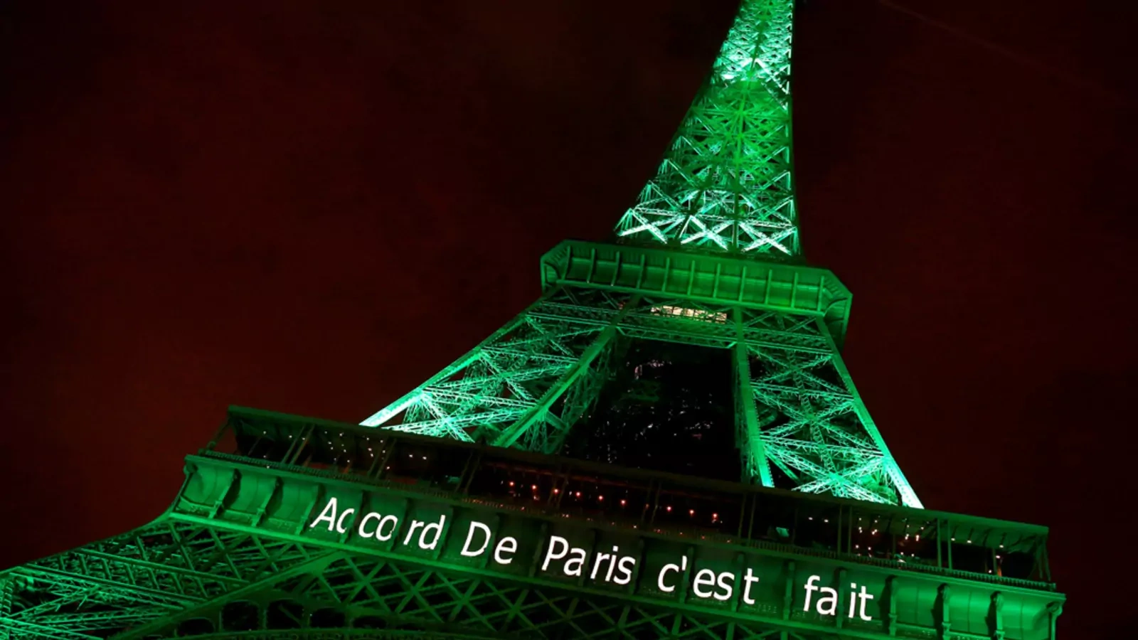 The Eiffel tower is illuminated in celebration of the Paris Agreement's entry into force in November 2016.