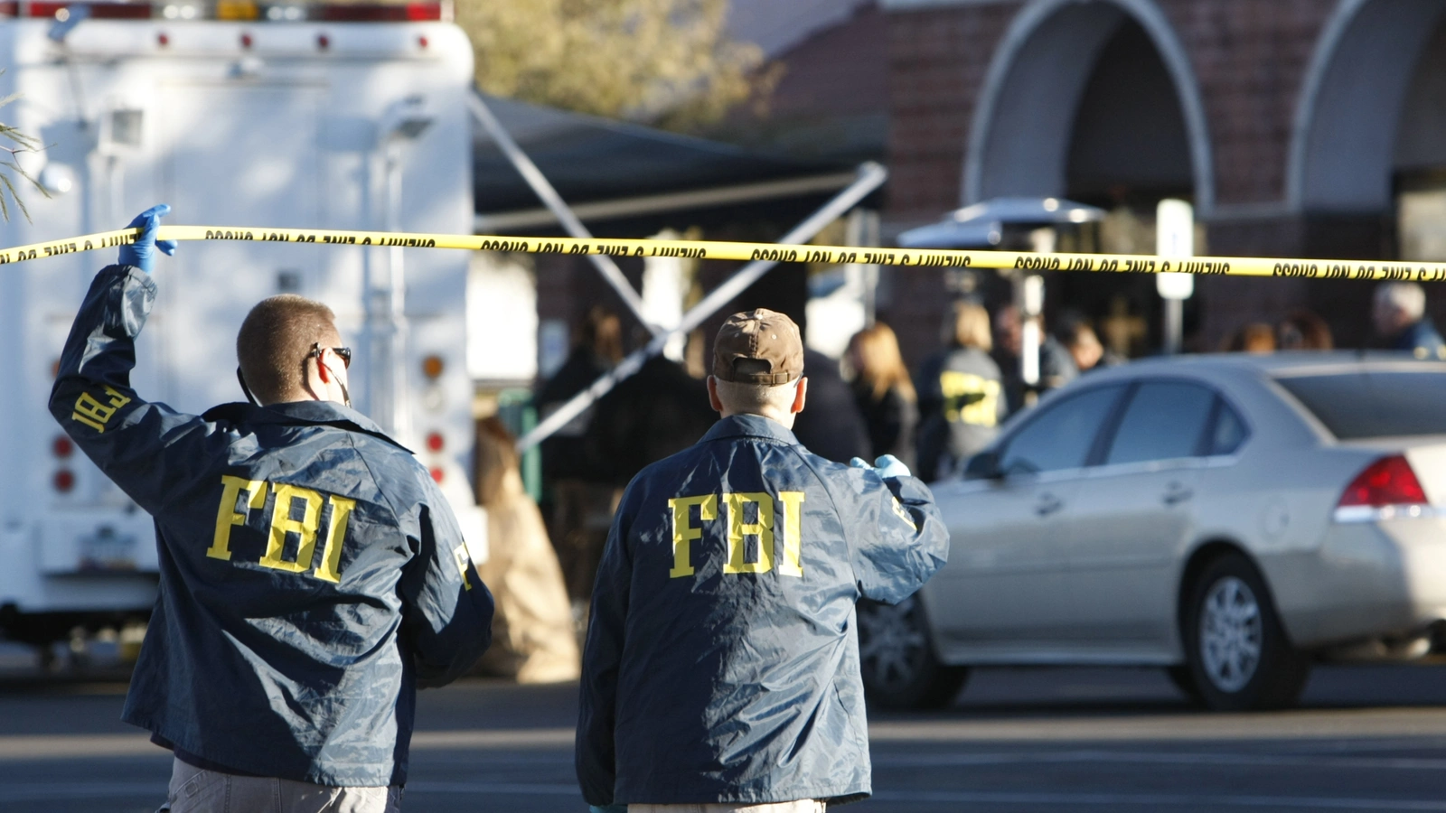 FBI agents respond to a crime scene.