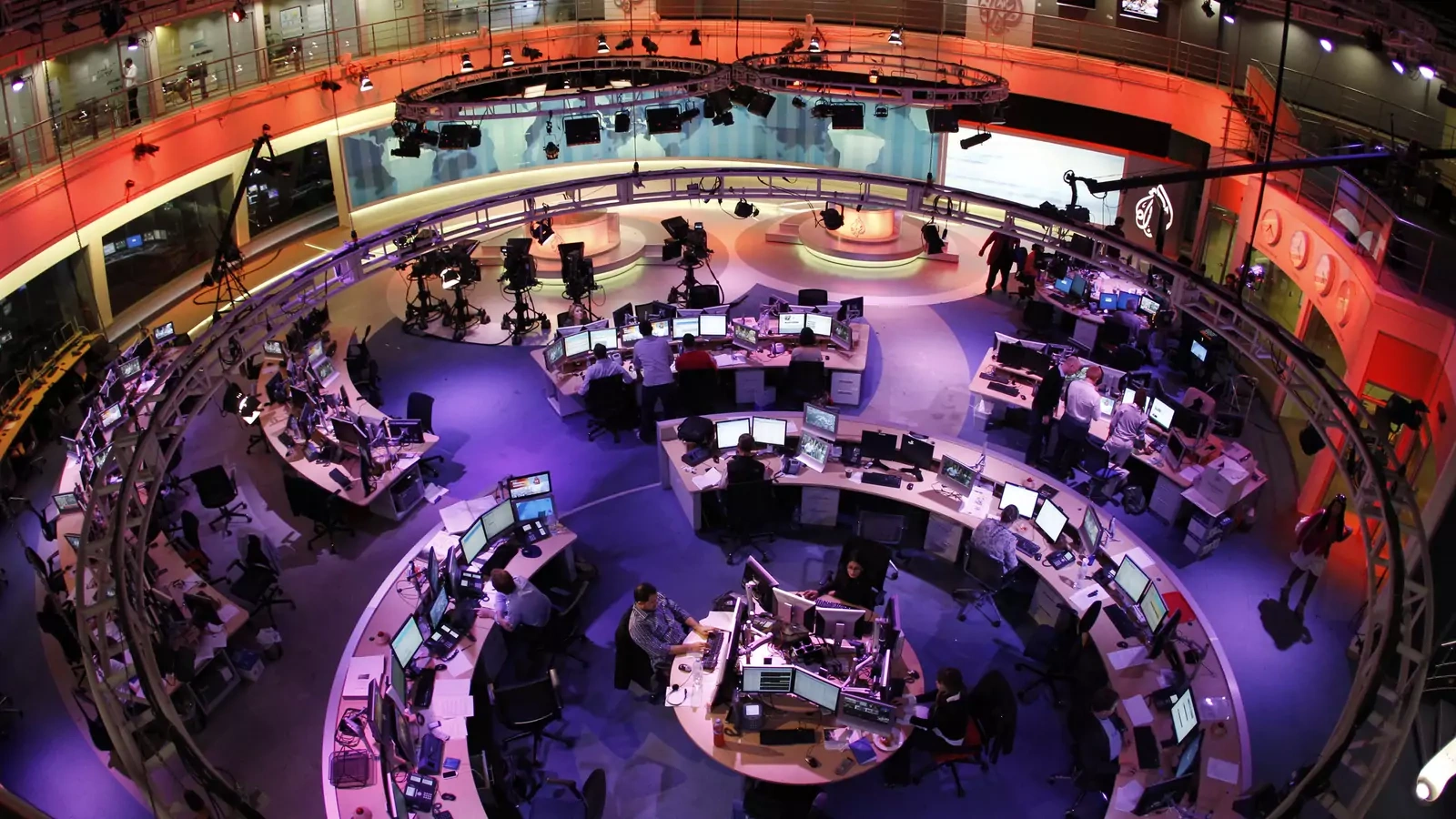 Al Jazeera English covers the 2011 Arab uprisings at its Doha headquarters.