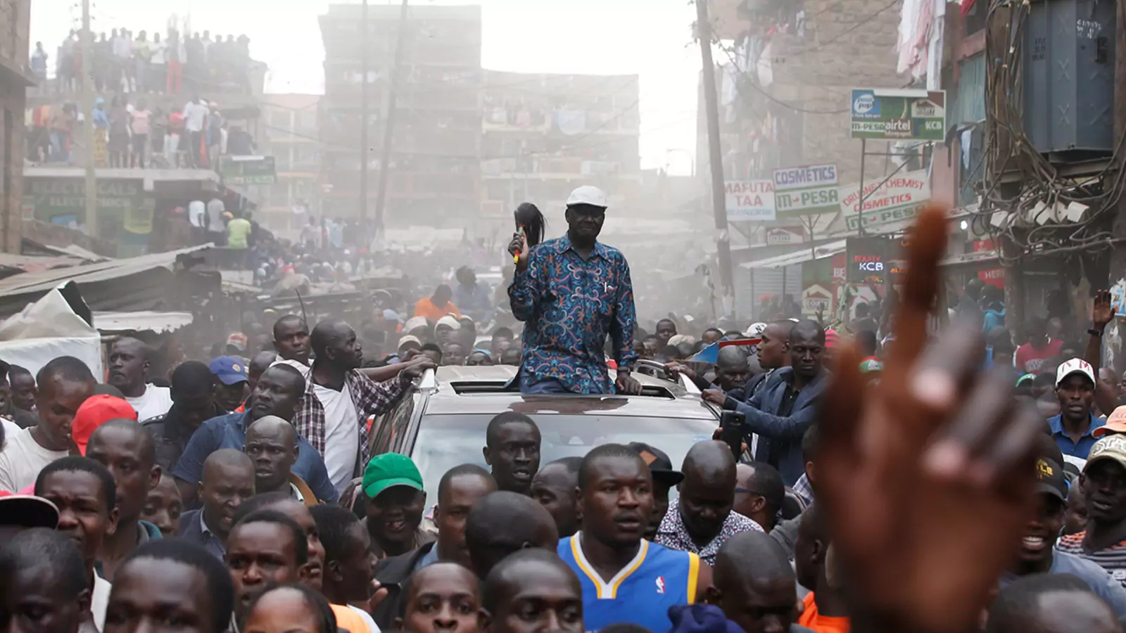 Opposition leader Raila Odinga greets supporters after a rally in Nairobi, Kenya.