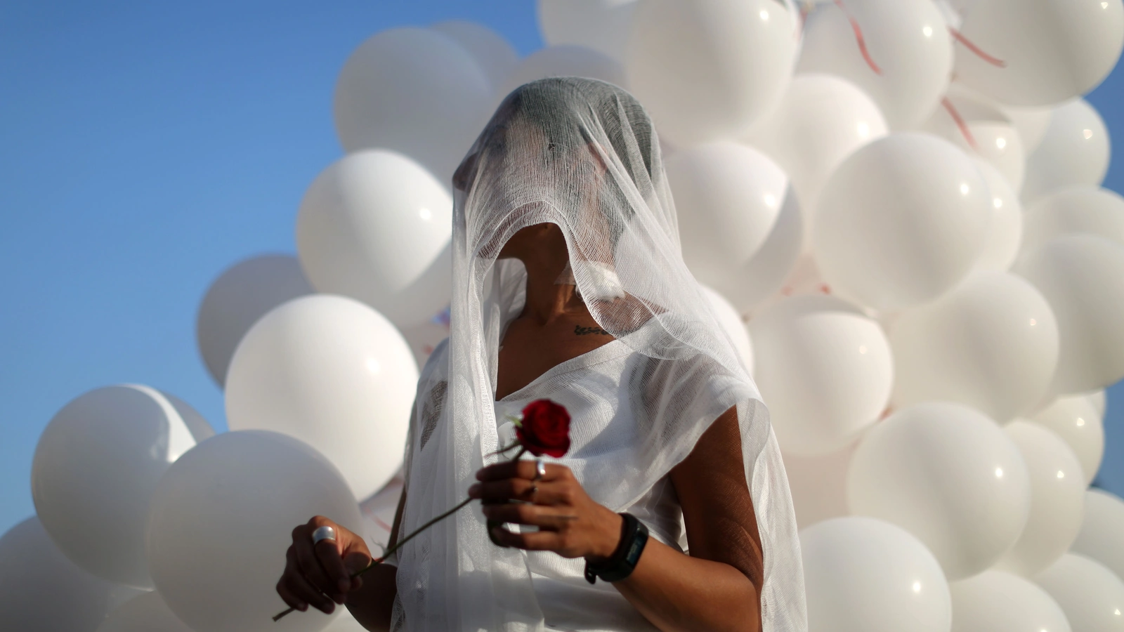 A Lebanese activist celebrates the repeal of a law that allowed rapists to marry their victims to avoid prosecution.