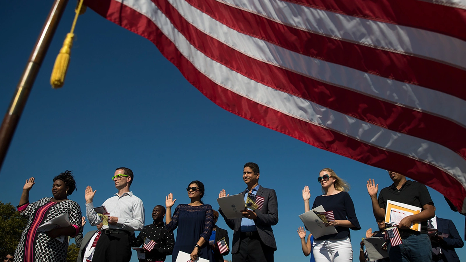 Immigrants become naturalized U.S. citizens by taking the oath of allegiance in Jersey City, New Jersey, in 2017. 