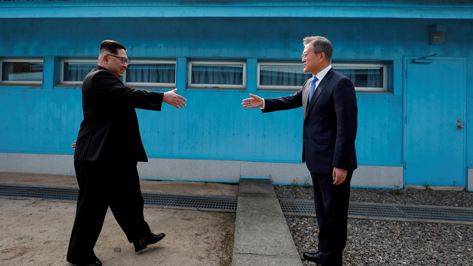 South Korean President Moon Jae-in and North Korean leader Kim Jong-un shake hands at the truce village of Panmunjom, South Korea, April 27, 2018. 