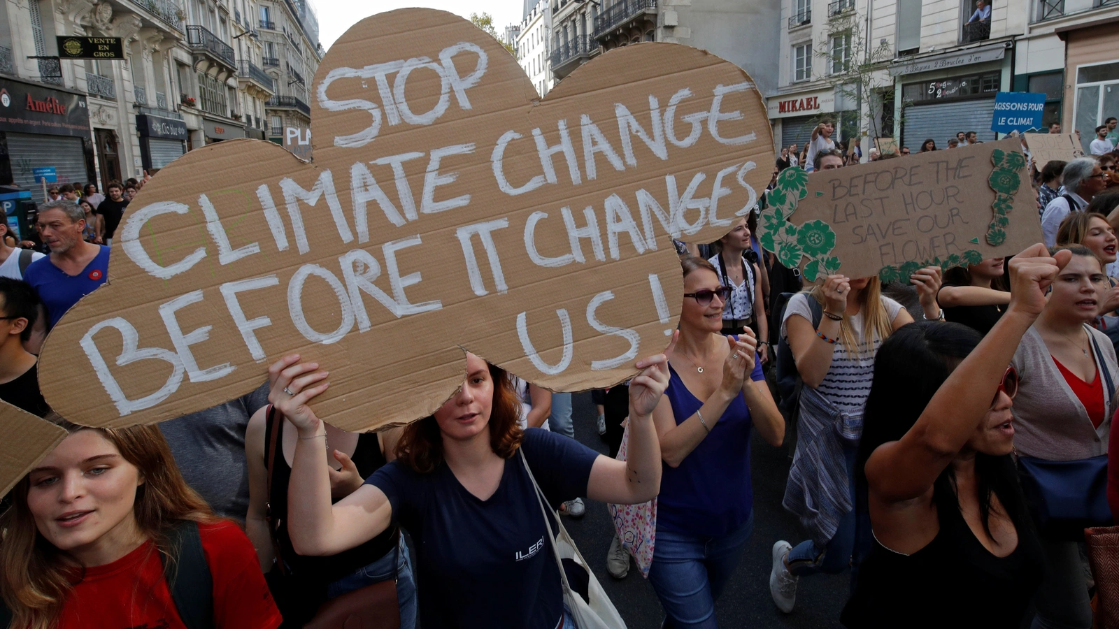 Protesters march to urge politicians to act against climate change