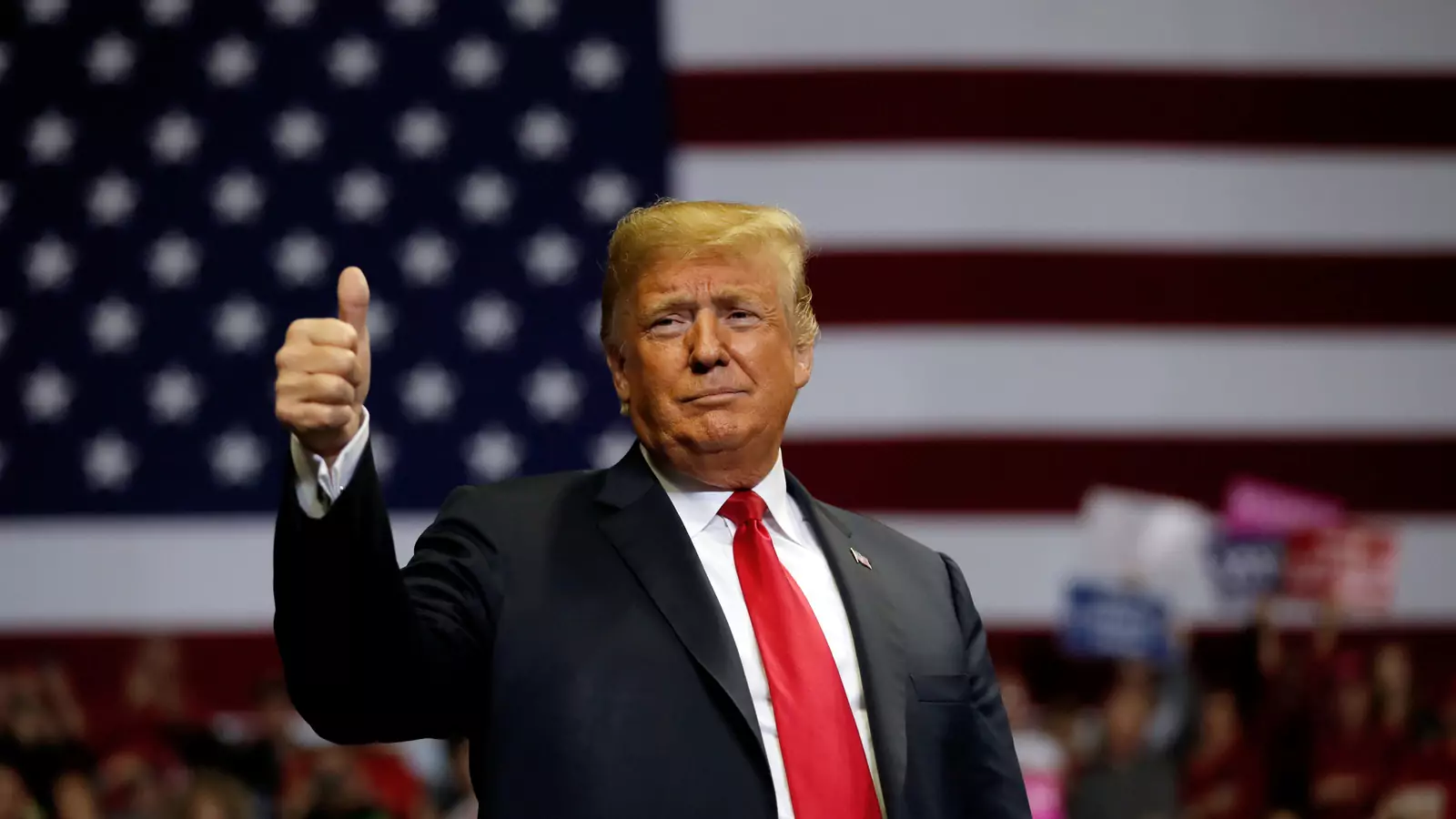 U.S. President Donald Trump gestures to supporters during a campaign rally at the Allen County War Memorial Coliseum in Fort Wayne, Indiana, U.S., November 5, 2018.
