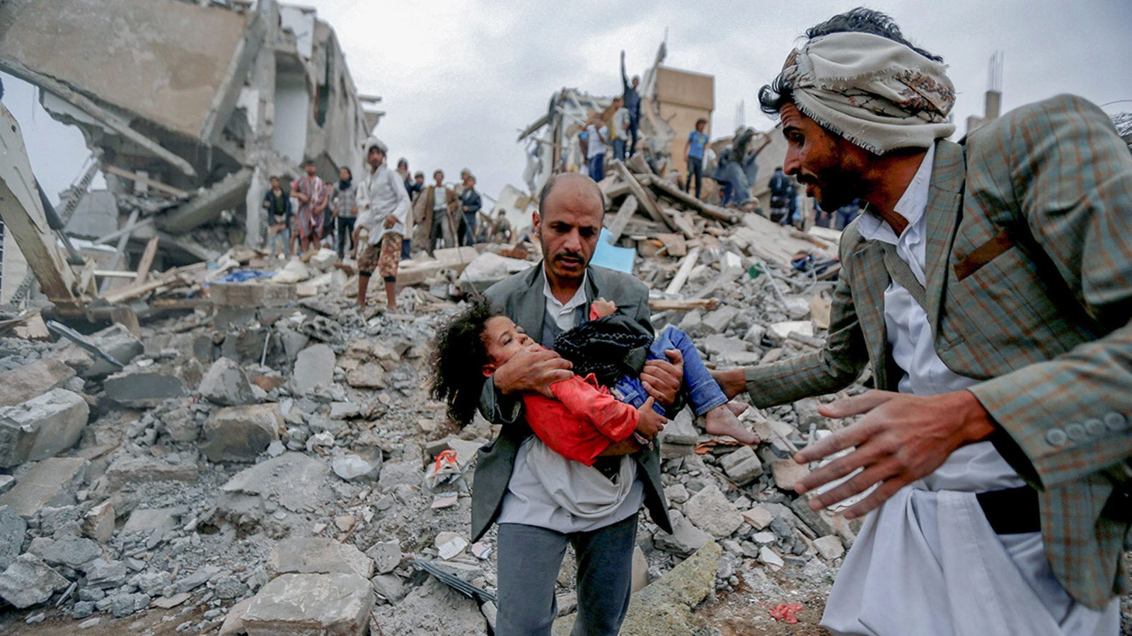 A child is rescued from the site of an air strike in Sanaa carried out by the Saudi-led coalition. 