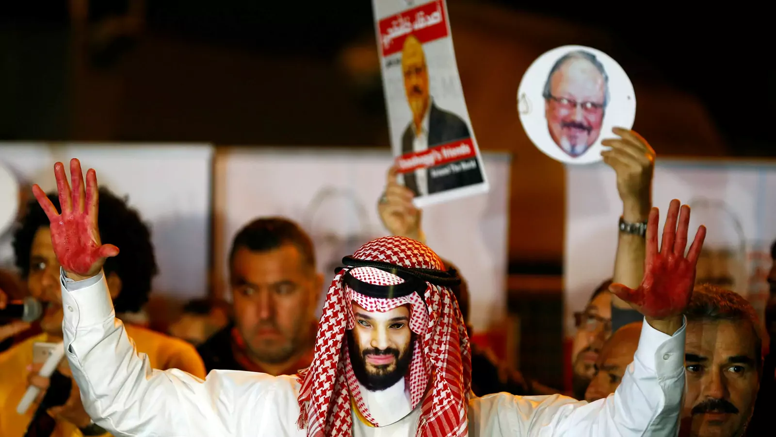 A demonstrator wearing a mask of Saudi Crown Prince Mohammed bin Salman attends a protest outside the Saudi Arabia consulate in Istanbul, Turkey October 25, 2018.