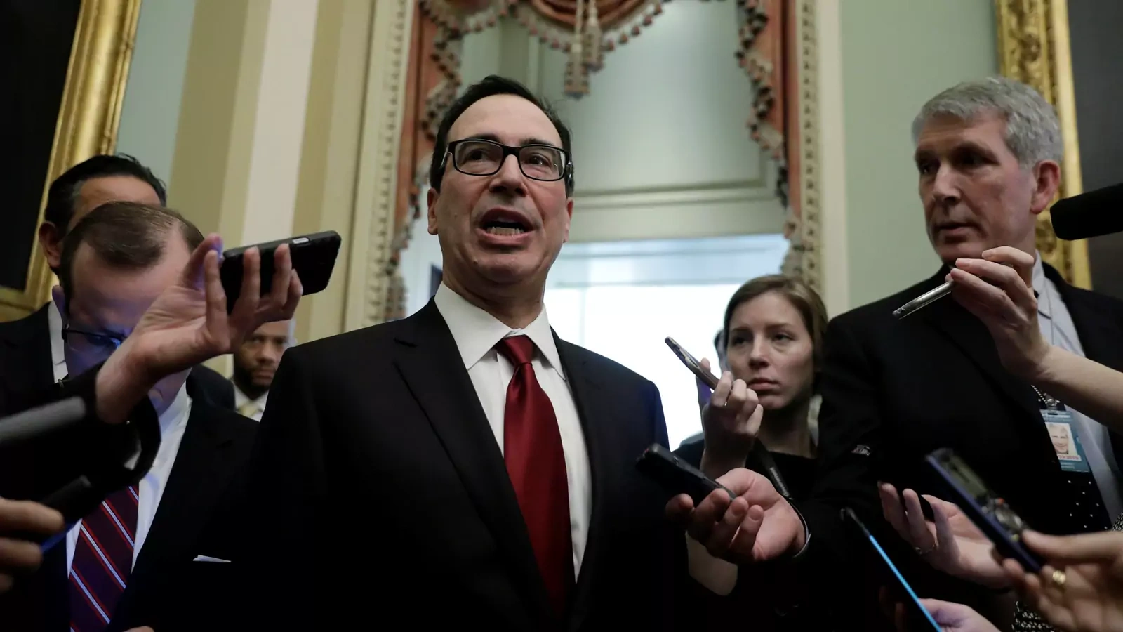 Treasury Secretary Steve Mnuchin discusses sanctions relief with Capitol Hill reporters.