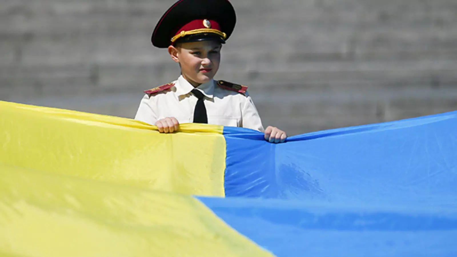 A cadet takes part in a ceremony dedicated to the anniversary of World War II in Kiev.