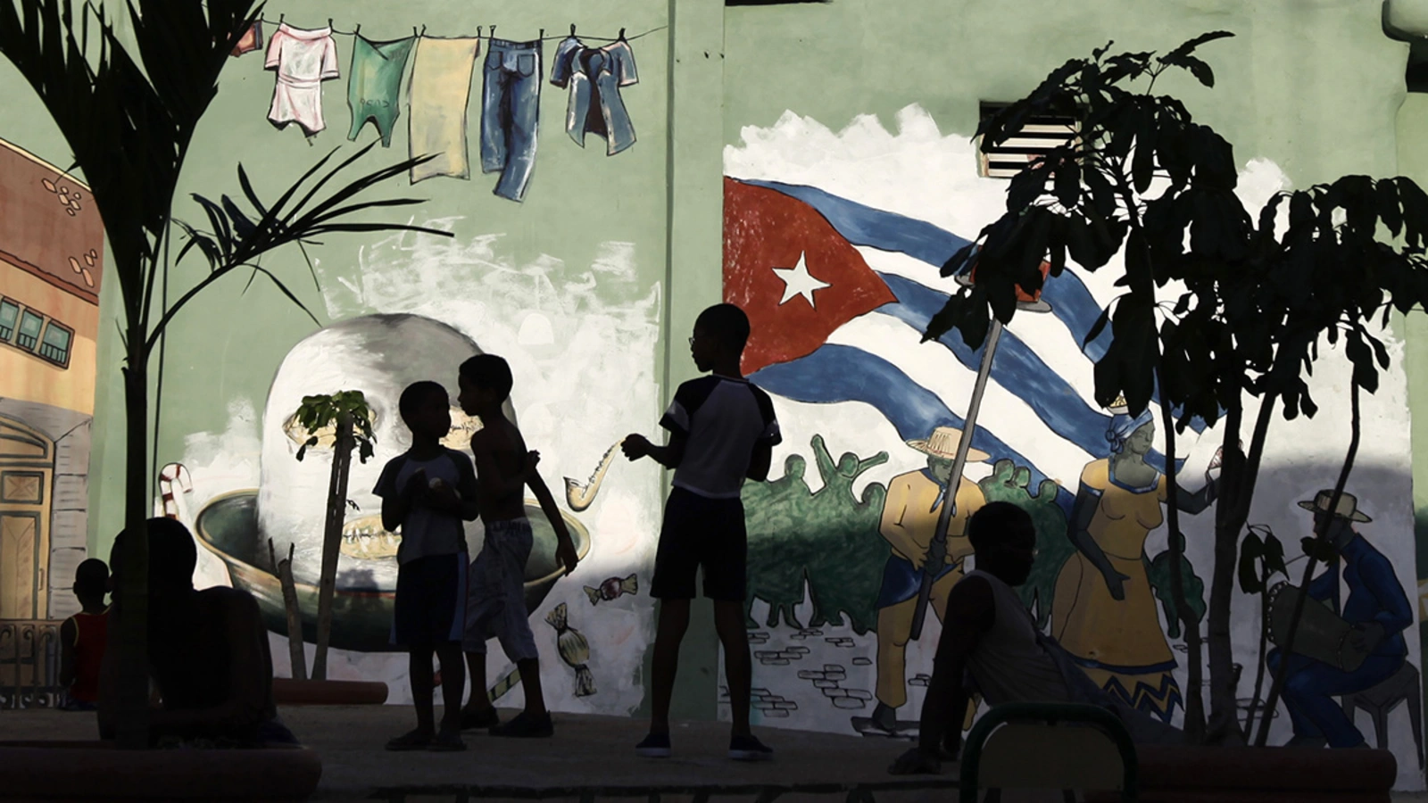 Children play in a square in Havana.