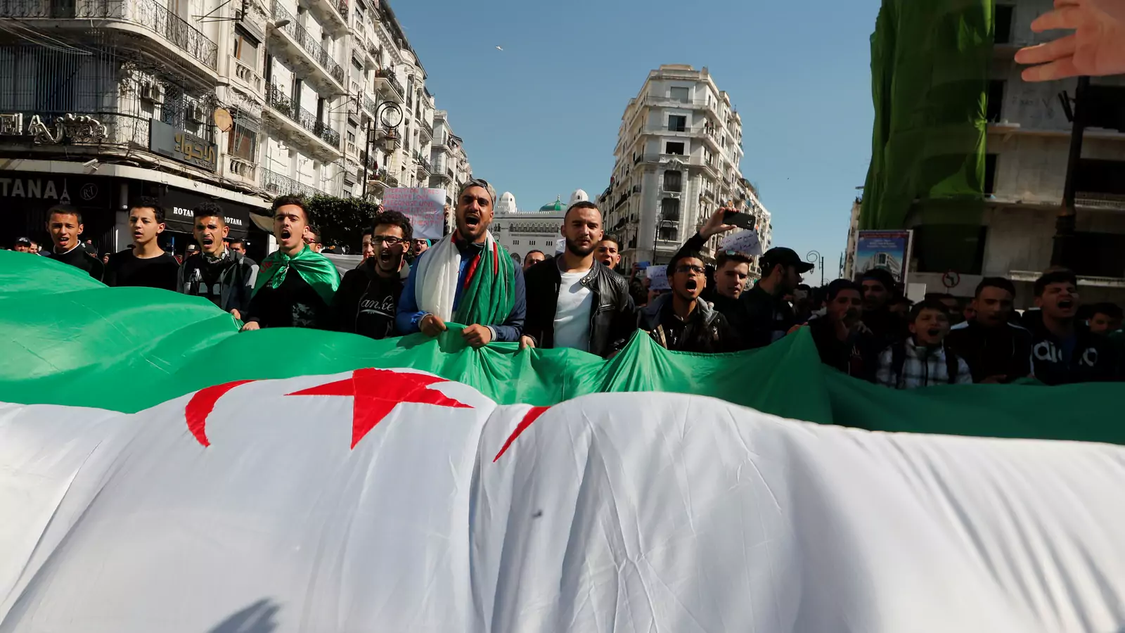 People take part in a protest demanding immediate political change in Algiers, Algeria March 12, 2019