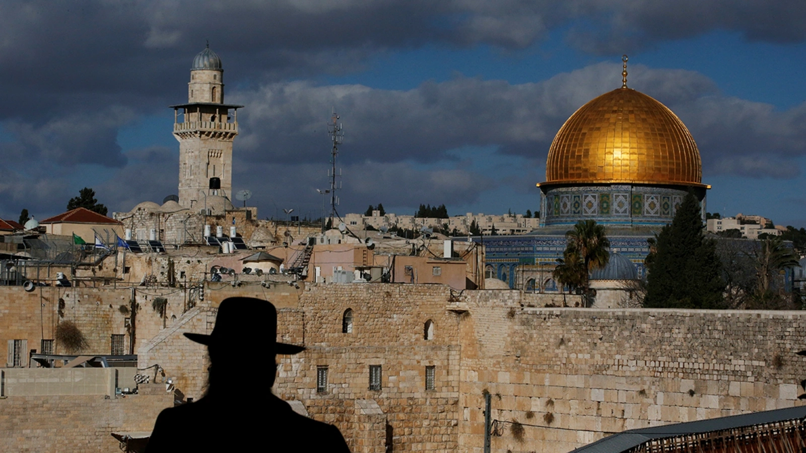 An Israeli man in front of the Dome of the Rock, located in Jerusalem’s occupied Old City on the compound known to Muslims as the Noble Sanctuary and to Jews as the Temple Mount.