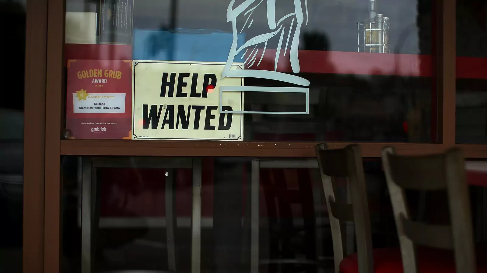 A local pizza restaurant advertises for workers in Encinitas, California, U.S.