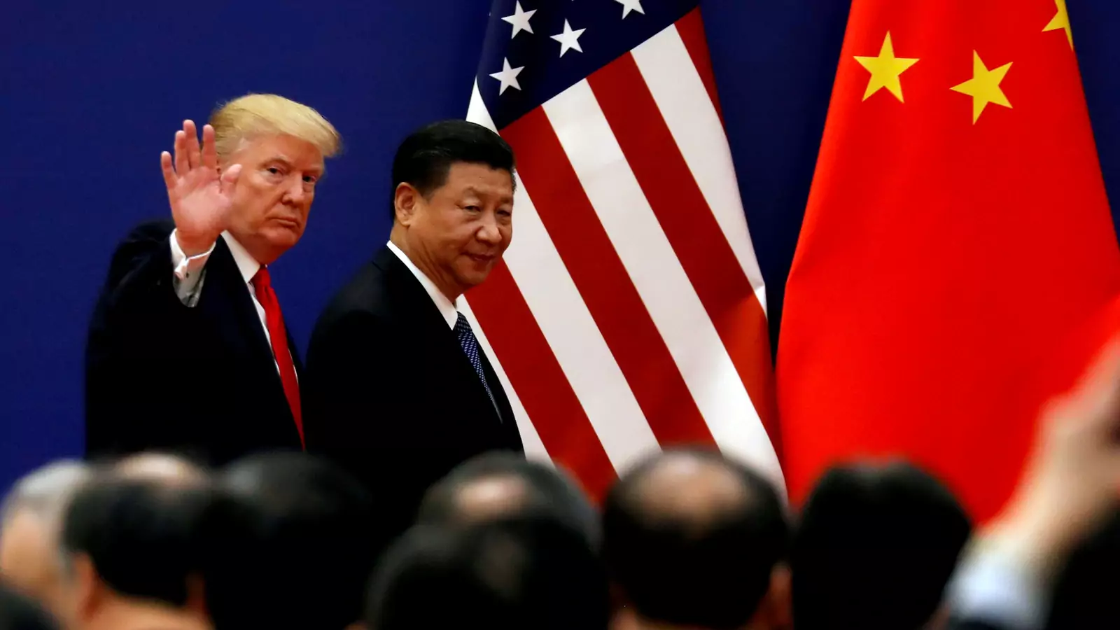 U.S. President Donald J. Trump and China's President Xi Jinping meet business leaders at the Great Hall of the People in Beijing, China, on November 9, 2017.