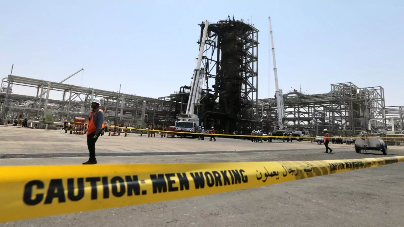 Workers at the damaged site of Saudi Aramco oil facility in Khurais, Saudi Arabia, September 20, 2019. 