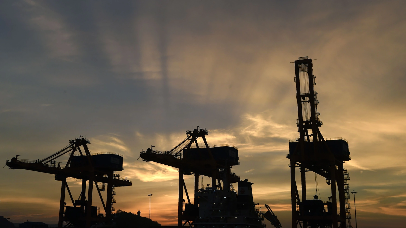 Iron ore unloaders in the port of Visakhapatnam, India.