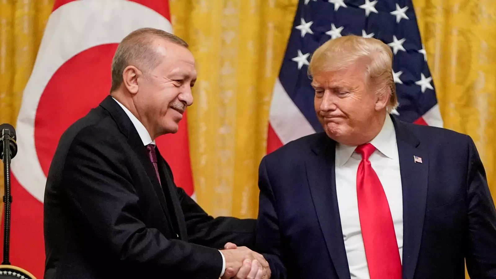 U.S. President Donald Trump greets Turkey's President Tayyip Erdogan during a joint news conference at the White House in Washington, U.S., November 13, 2019.