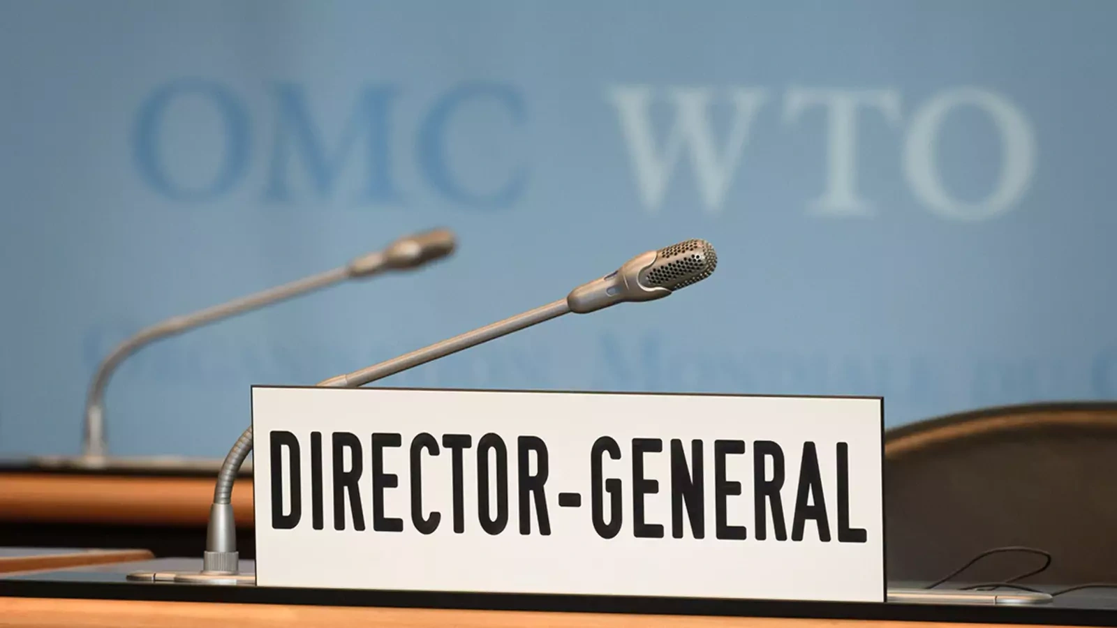 A picture taken on July 23, 2020 shows the empty seat and desk of the World Trade Organization (WTO) director-general prior to a general council in Geneva. 