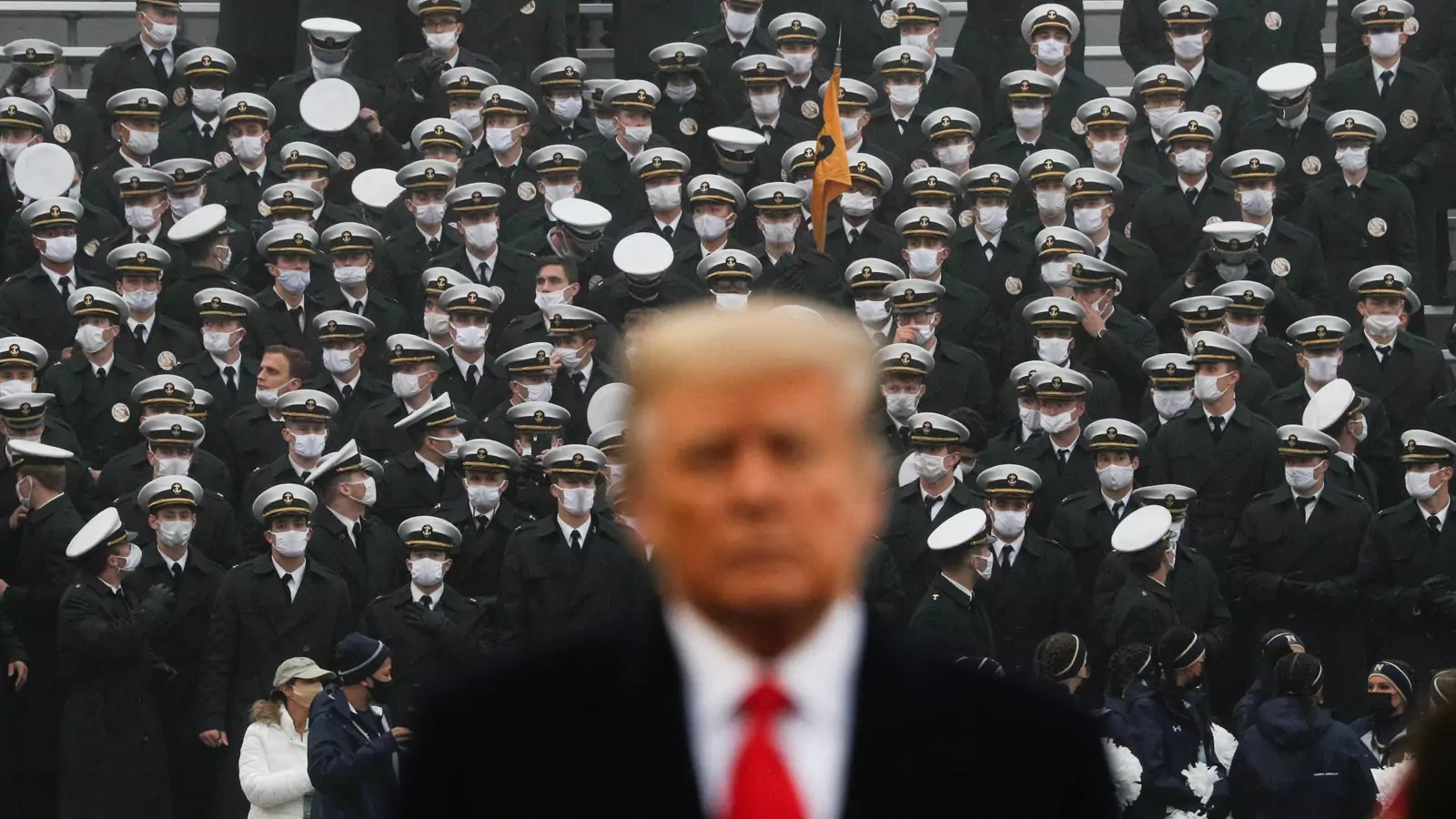 U.S. President Trump stands onto the field at Michie Stadium ahead of the annual Army-Navy collegiate football game.
