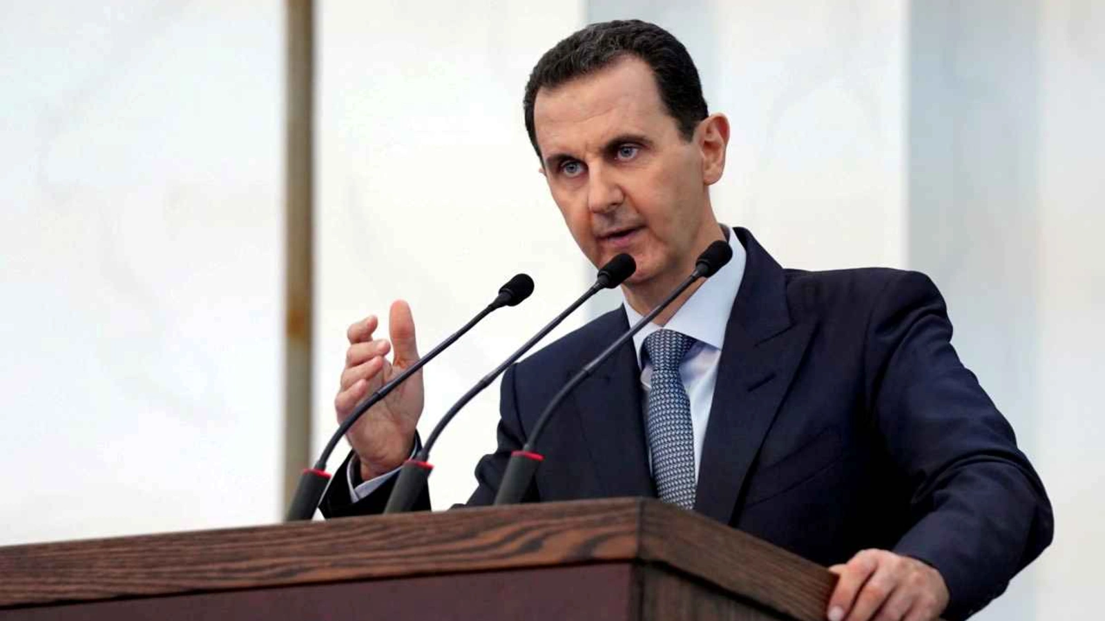 Syrian President Bashar al-Assad addresses members of parliament in Damascus.