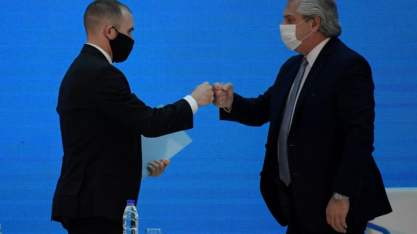 Argentine Finance Minister Martín Guzmán greets President Alberto Fernández 