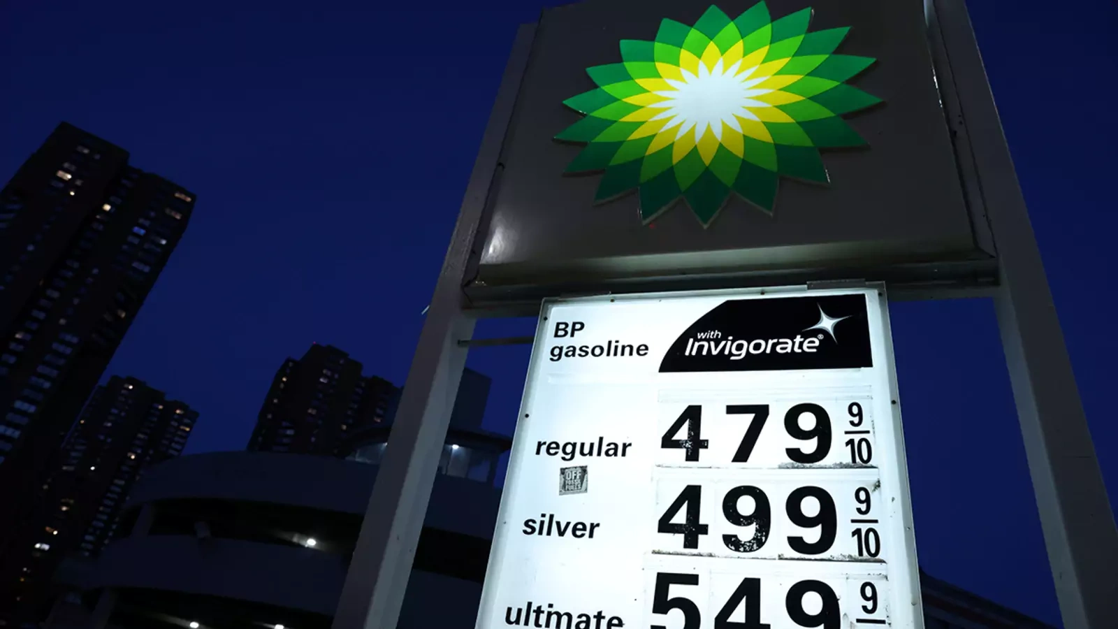 Prices are seen displayed at a BP gas station in New York City in November 2021.