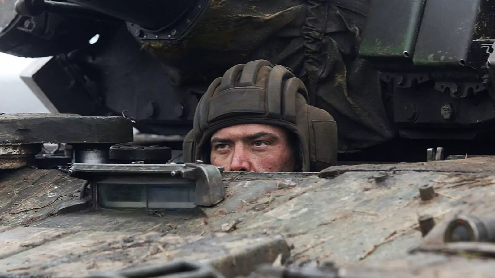 A serviceman of pro-Russian militia in a tank of armed forces of the separatist self-proclaimed Luhansk People's Republic on February 27, 2022