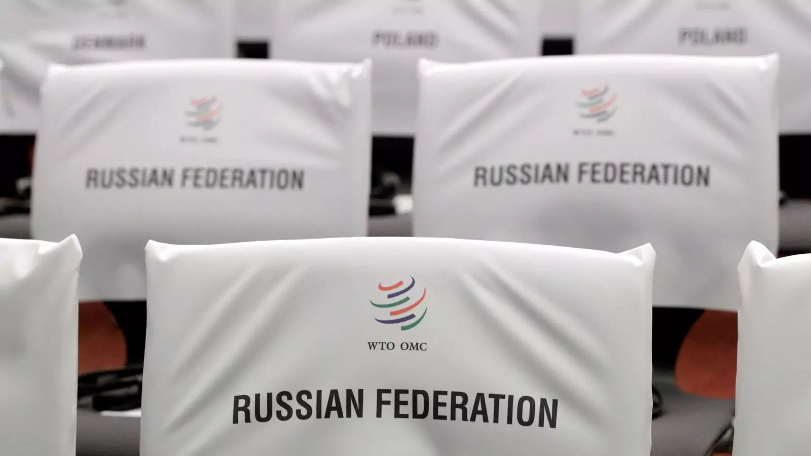 Seats for delegates are pictured before the ceremony marking the accession of Russia to the WTO during the 8th WTO Ministerial Conference in Geneva in December 2011.
